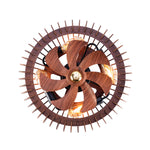 Direct underside view of an 8.80 lbs bladed chandelier fan showcasing a central 7 blade turbine enclosed in a geometric semicircle metal cage guard.