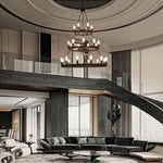 Extra large farmhouse pendant light installed in a high-ceiling grand foyer