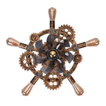 Direct underside view of a ZEUSFULLY 19.6 inch steampunk caged ceiling fan with 5 radial light sockets and a central smoke-tinted 7-blade turbine.