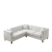 premium beige velvet l shaped sectional sofa with deep button tufting in luxury modern living room