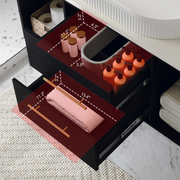 Interior view of floating bathroom cabinet showing soft close drawer sliders and 80cm adjustable flexible drainage pipe installation.