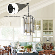 Adjustable height industrial iron hanging light over a farmhouse dining table