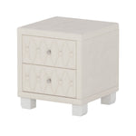 close up handcrafted deep button tufting on plush lint free pink velvet bedside table