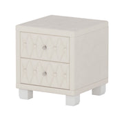 close up handcrafted deep button tufting on plush lint free pink velvet bedside table