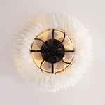 Direct underside view of an 8.36 lbs bladed chandelier fan showcasing a central 7-blade turbine inside a decorative feather pattern white metal guard.